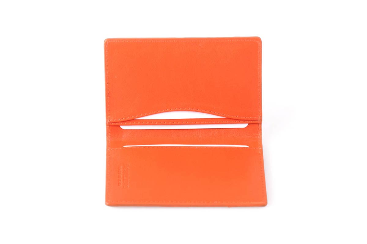 Card holder in orange ostrich leather